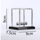 Science-themed home decor with mini Newton balance balls