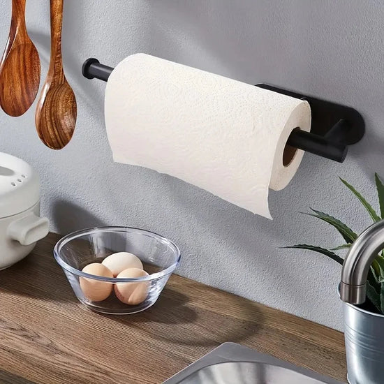 Space-saving kitchen organizer for paper towels and plastic wrap