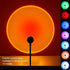 Sunset projection lamp illuminating room with vibrant colors