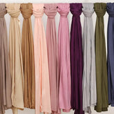 Soft plain cotton headscarf for women, used as a hijab or stylish headband wrap