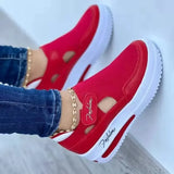 Women’s walking shoes with elevated platform sole and breathable mesh material