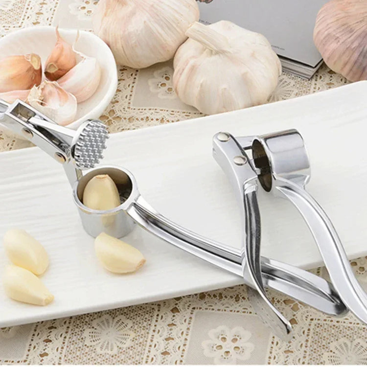 Stainless steel manual garlic press for crushing garlic into paste
