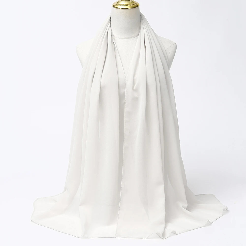 Lightweight voile headscarf in soft pastel tones, ideal for Muslim women&