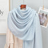 Elegant striped shawl wrap with tassel ends, suitable for casual and formal wear