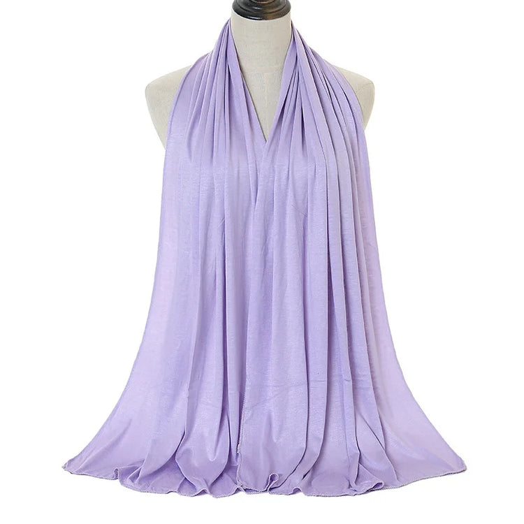 Long Muslim shawl made of modal cotton jersey fabric, wrapped elegantly around the head and ne