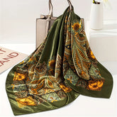Elegant paisley print scarf styled as a fashionable necktie or handbag accessory