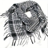 Arab shemagh scarf with traditional houndstooth pattern, styled as a face and neck wrap for sun protection