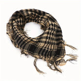 Arab shemagh scarf with traditional houndstooth pattern, styled as a face and neck wrap for sun protection