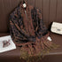 Soft and warm cashmere hijab with bohemian print, styled as a headscarf or wrap
