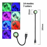 Sunset projection lamp illuminating room with colorful light