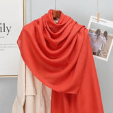 Elegant striped shawl wrap with tassel ends, suitable for casual and formal wear
