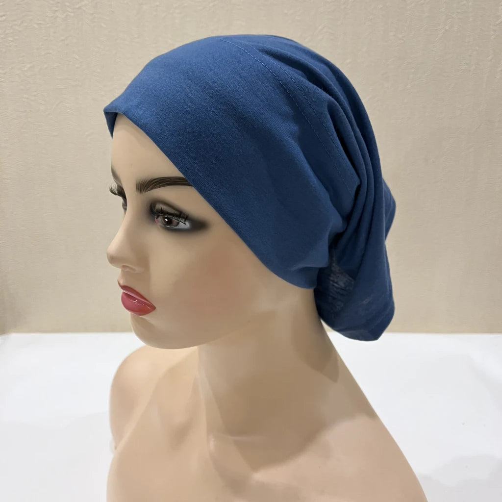 Lightweight spandex turban bonnet in beige, styled under a chiffon hijab