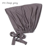 Soft elastic modal underscarf in beige, providing comfortable fit under hijabs for Muslim women 