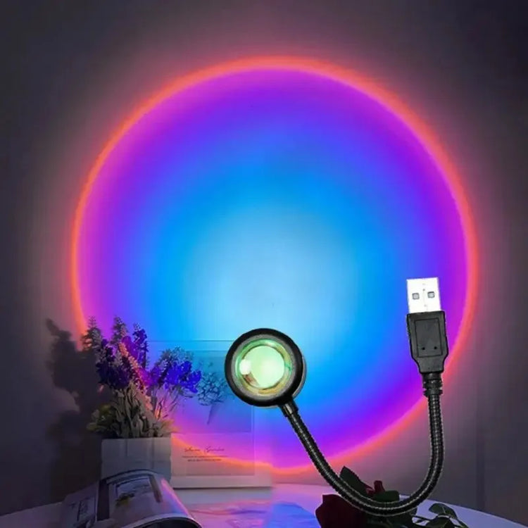 Sunset projection lamp illuminating room with vibrant colors