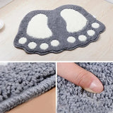Water absorbent bathroom rug with non-slip backing