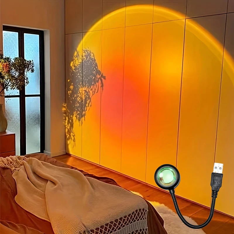 Sunset projection lamp illuminating room with colorful light