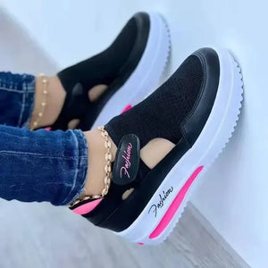 Women’s walking shoes with elevated platform sole and breathable mesh material