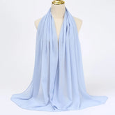 Lightweight voile headscarf in soft pastel tones, ideal for Muslim women&