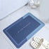 Absorbent bathroom bath mat with anti-slip backing