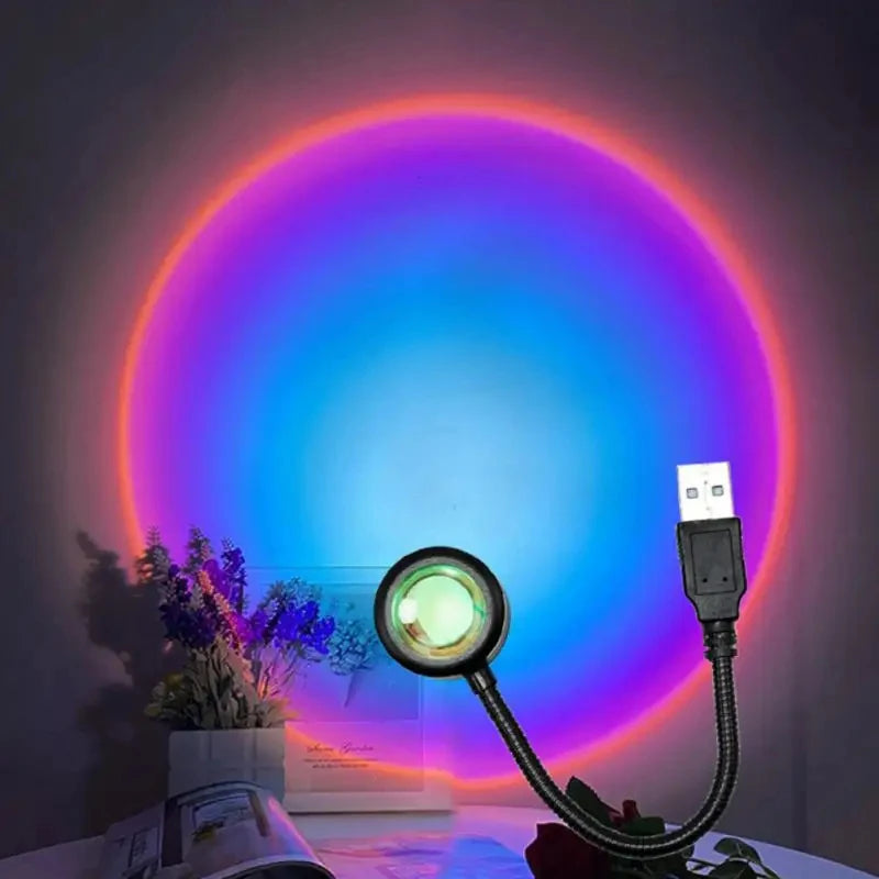 Sunset projection lamp illuminating room with colorful light
