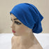 Lightweight spandex turban bonnet in beige, styled under a chiffon hijab
