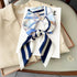 Luxury design satin neck scarf for women, ideal for accessorizing bags or outfits