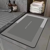Water-absorbing bath mat with anti-skid backing