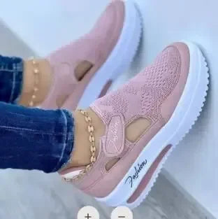 Women’s walking shoes with elevated platform sole and breathable mesh material
