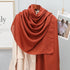 Elegant striped shawl wrap with tassel ends, suitable for casual and formal wear