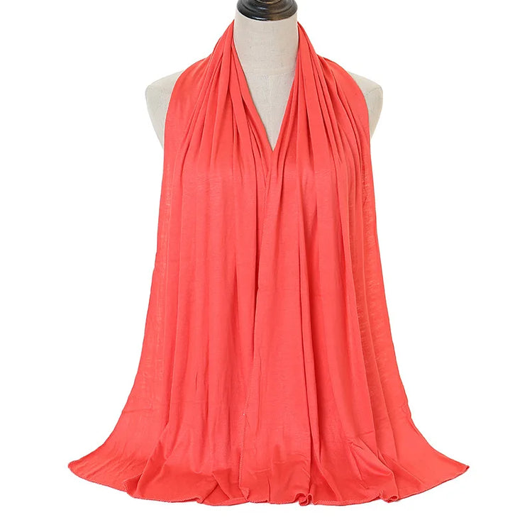 Long Muslim shawl made of modal cotton jersey fabric, wrapped elegantly around the head and ne