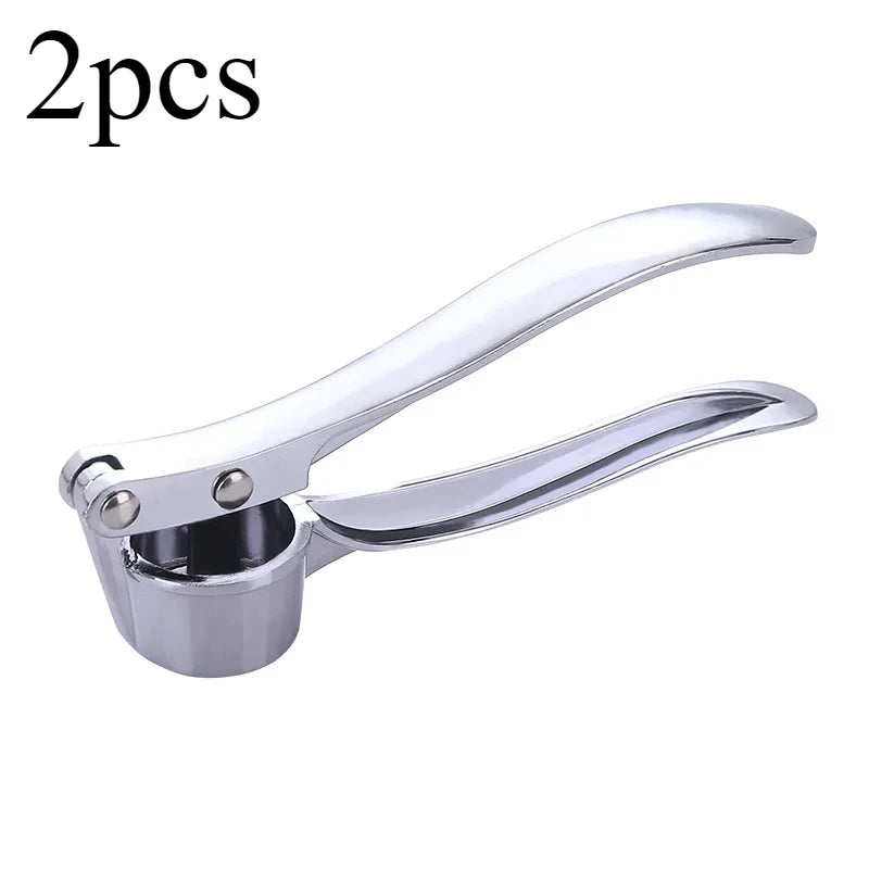 Stainless steel manual garlic press for crushing garlic into paste