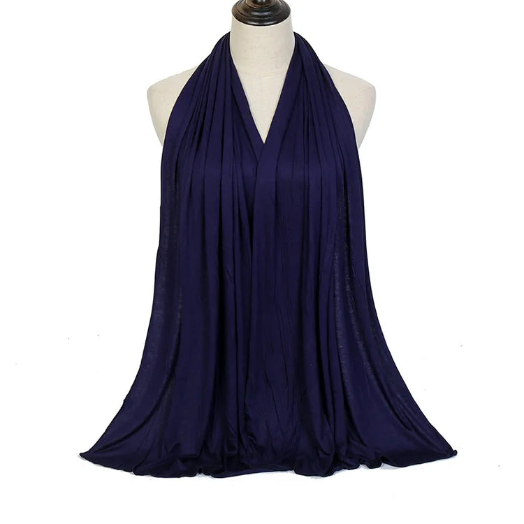 Long Muslim shawl made of modal cotton jersey fabric, wrapped elegantly around the head and ne