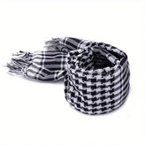 Arab shemagh scarf with traditional houndstooth pattern, styled as a face and neck wrap for sun protection
