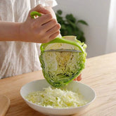 Durable cabbage grater and fruit peeler made from food-grade stainless steel