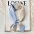 Polka dot silk bandana for women, worn as a ribbon, shawl, or stylish hijab