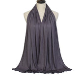 Long Muslim shawl made of modal cotton jersey fabric, wrapped elegantly around the head and ne