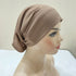 Lightweight spandex turban bonnet in beige, styled under a chiffon hijab