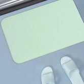 Absorbent bathroom mat for dormitories and home use