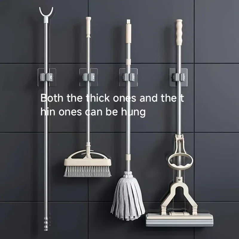Mop and broom organizer with hooks for wall mounting