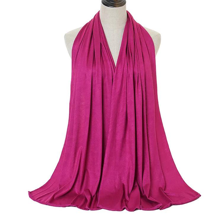 Long Muslim shawl made of modal cotton jersey fabric, wrapped elegantly around the head and ne