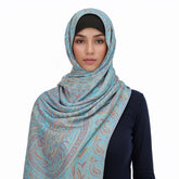 Soft and warm cashmere hijab with bohemian print, styled as a headscarf or wrap