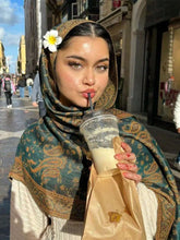 Soft and warm cashmere hijab with bohemian print, styled as a headscarf or wrap