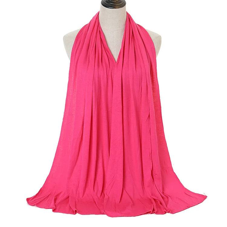Long Muslim shawl made of modal cotton jersey fabric, wrapped elegantly around the head and ne