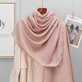 Elegant striped shawl wrap with tassel ends, suitable for casual and formal wear