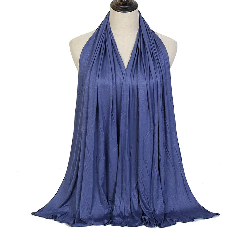 Long Muslim shawl made of modal cotton jersey fabric, wrapped elegantly around the head and ne