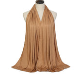Long Muslim shawl made of modal cotton jersey fabric, wrapped elegantly around the head and ne