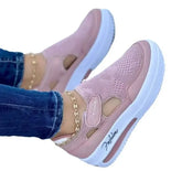 Women’s walking shoes with elevated platform sole and breathable mesh material