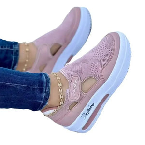Women’s walking shoes with elevated platform sole and breathable mesh material