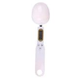 Electronic kitchen scale measuring 0.1–500g with detachable spoon