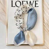 Polka dot silk bandana for women, worn as a ribbon, shawl, or stylish hijab